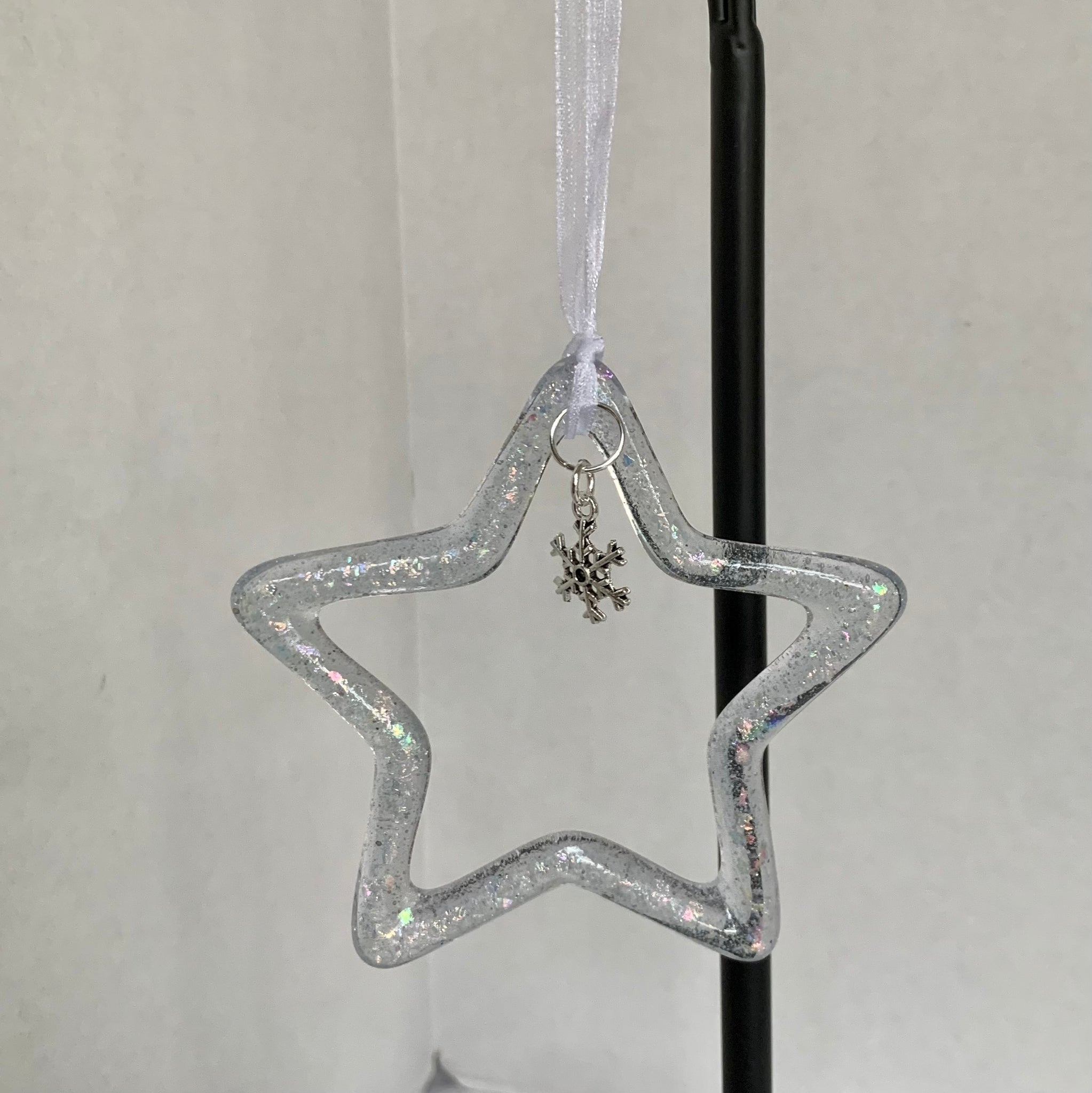 Dicroic Star ornaments with snowflake charm.
