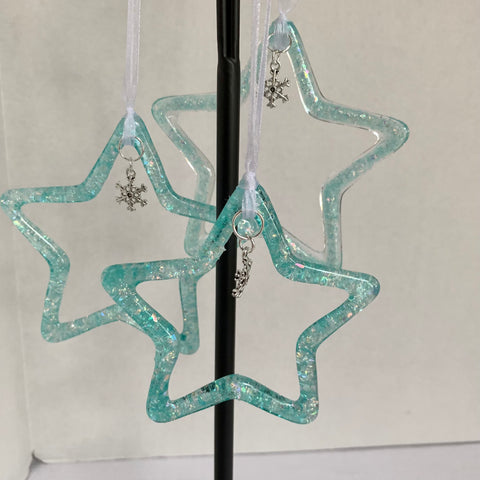 Dicroic Star ornaments with snowflake charm.