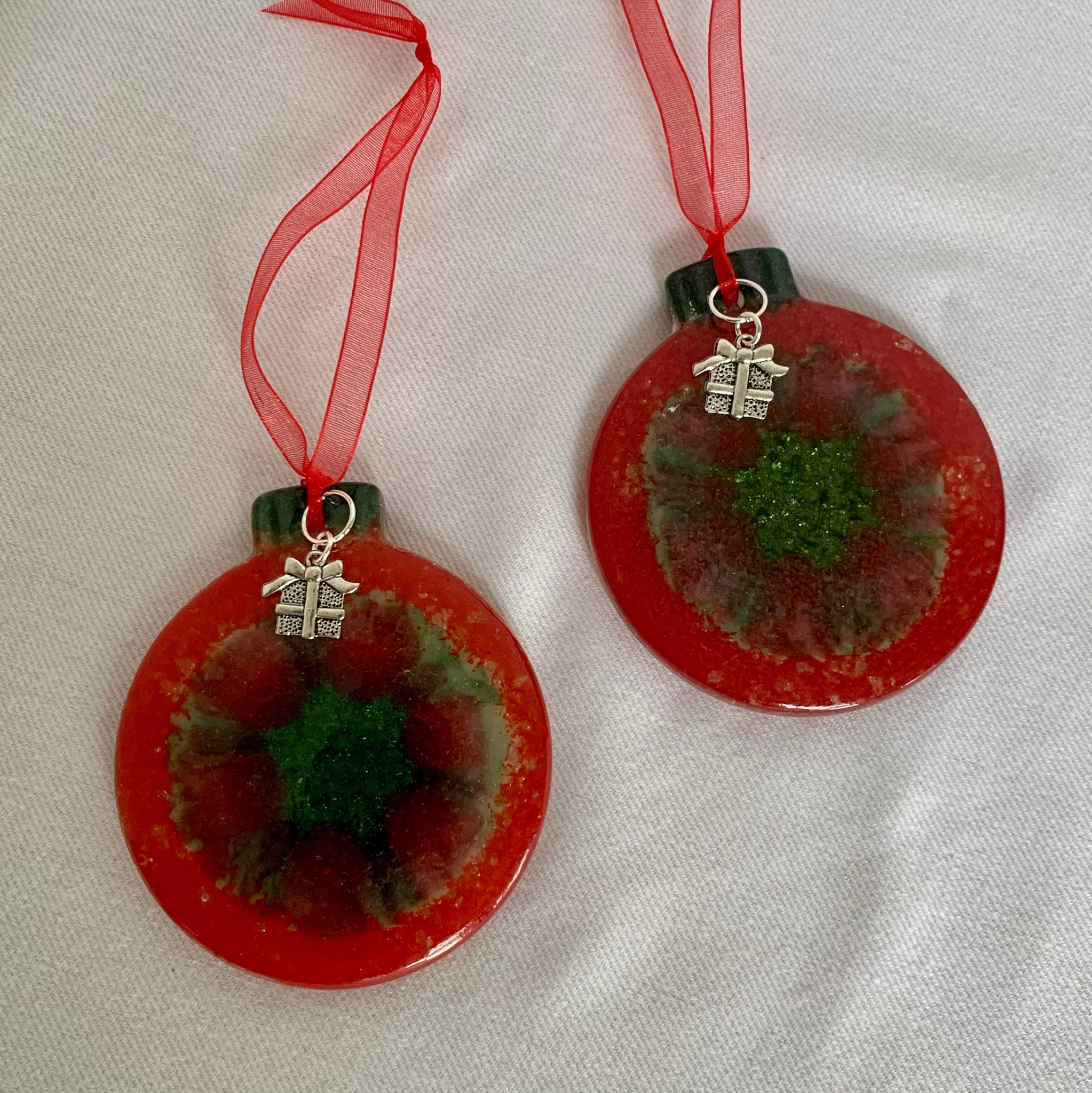 Red and aventurine green ornaments with gift box charms